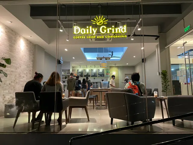 The lit-up shop front of Daily Grind Coffee in United San Pedro, San Pedro City, Laguna