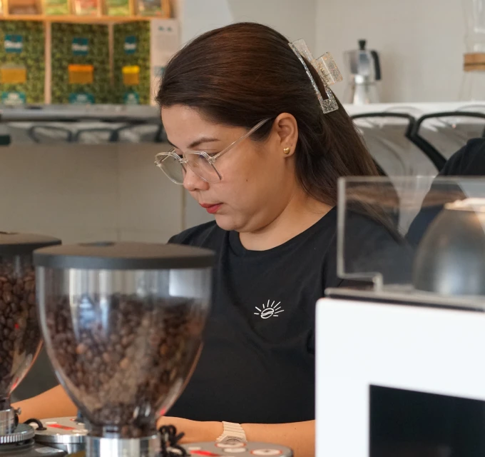 Franchising Woman Preparing Coffee